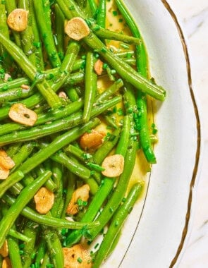 A close up of italian green bean salad in a bowl.
