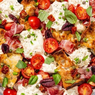 Burrata salad on a platter.