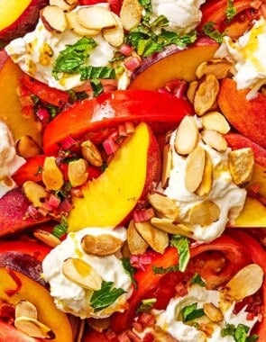 A close up of the peach burrata salad.
